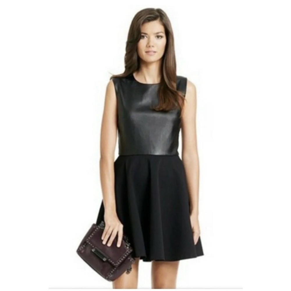 Diane Von Furstenberg black flair waist above the knee dress with leather top.